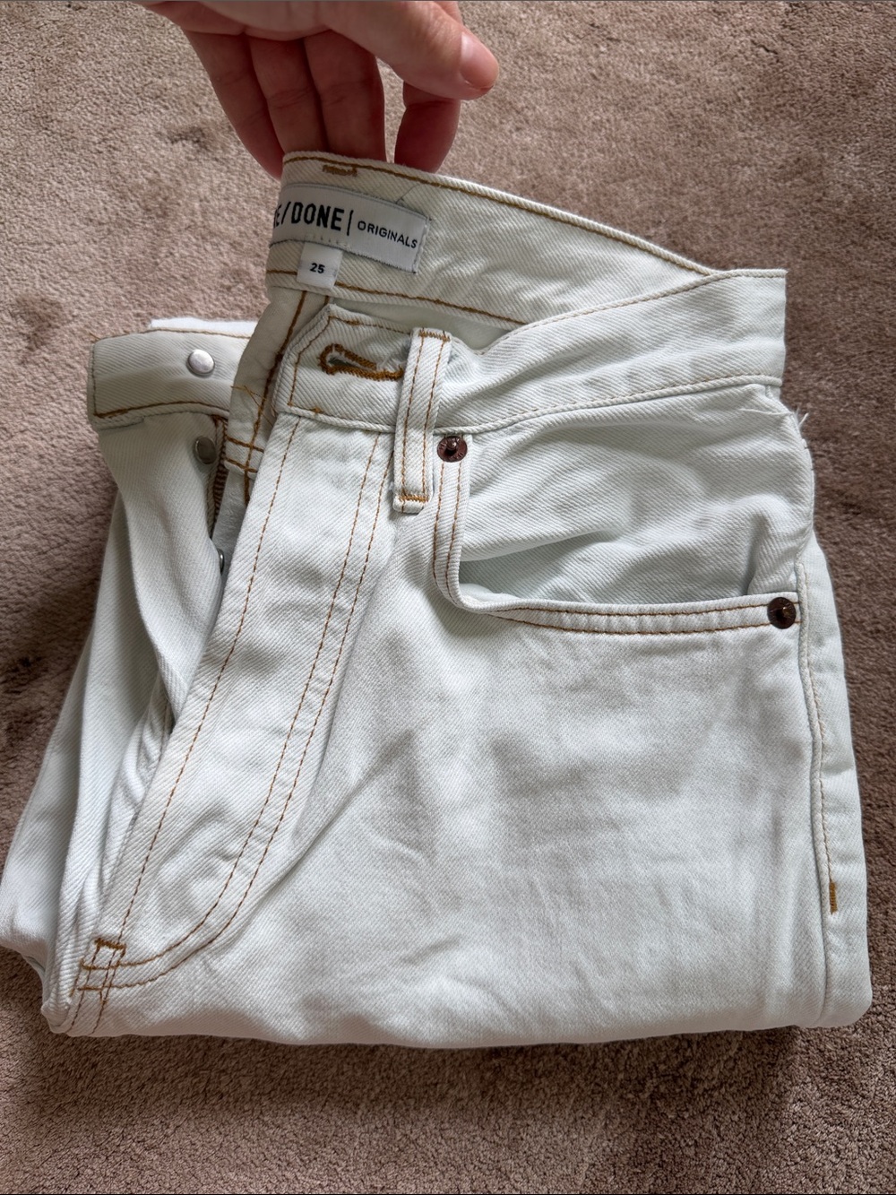 Re/Done Women's White Jeans with Contrast stitch.